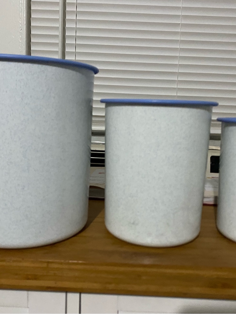Vintage Nesting Tupperware Blue-Rim White Ceramic Canisters